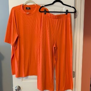 Dressed in LALA Orange Ribbed Playsuit